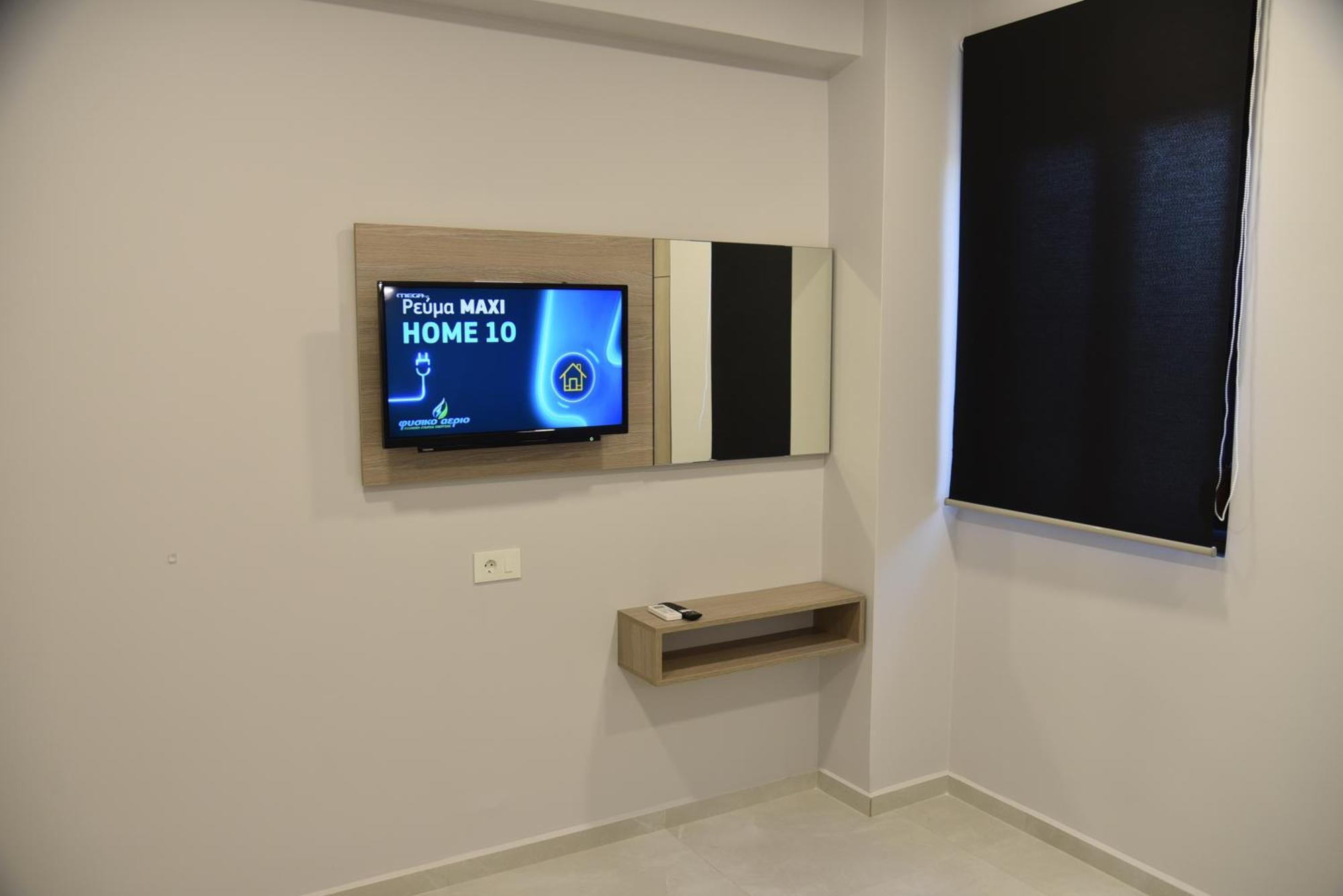 Pirgos Deluxe Apartment - Private Parking กิสเซมอส ภายนอก รูปภาพ